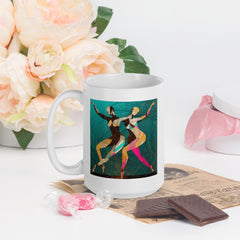 Close-up of a dance-themed white glossy coffee mug.