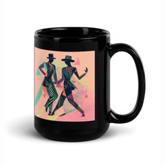 Elegant black mug with balletic design, ideal for coffee or tea.
