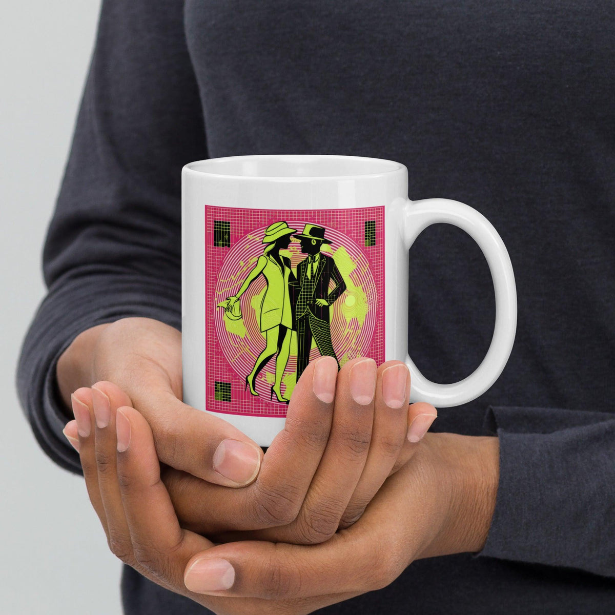 Balletic Intensity white glossy mug on a light wooden table.