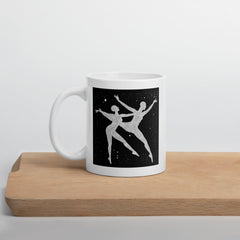 Balletic Poise Attire mug filled with steaming coffee, white background.