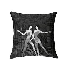 Close-up of balletic romance attire pattern on cozy indoor pillow.