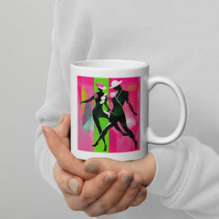 Balletic Synergy Attire white glossy mug on a coffee table.