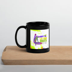 Elegant yoga-themed Camel Pose black glossy mug.