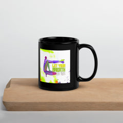 Stylish black mug featuring Camel Pose yoga artwork.