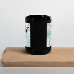 Elegant black glossy mug with balance-inspired yoga design.