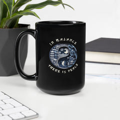 Symbolic Tree of Life on a sleek black coffee mug.