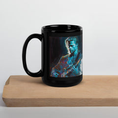 NS-815 Black Glossy Mug filled with steaming coffee, book in the background.