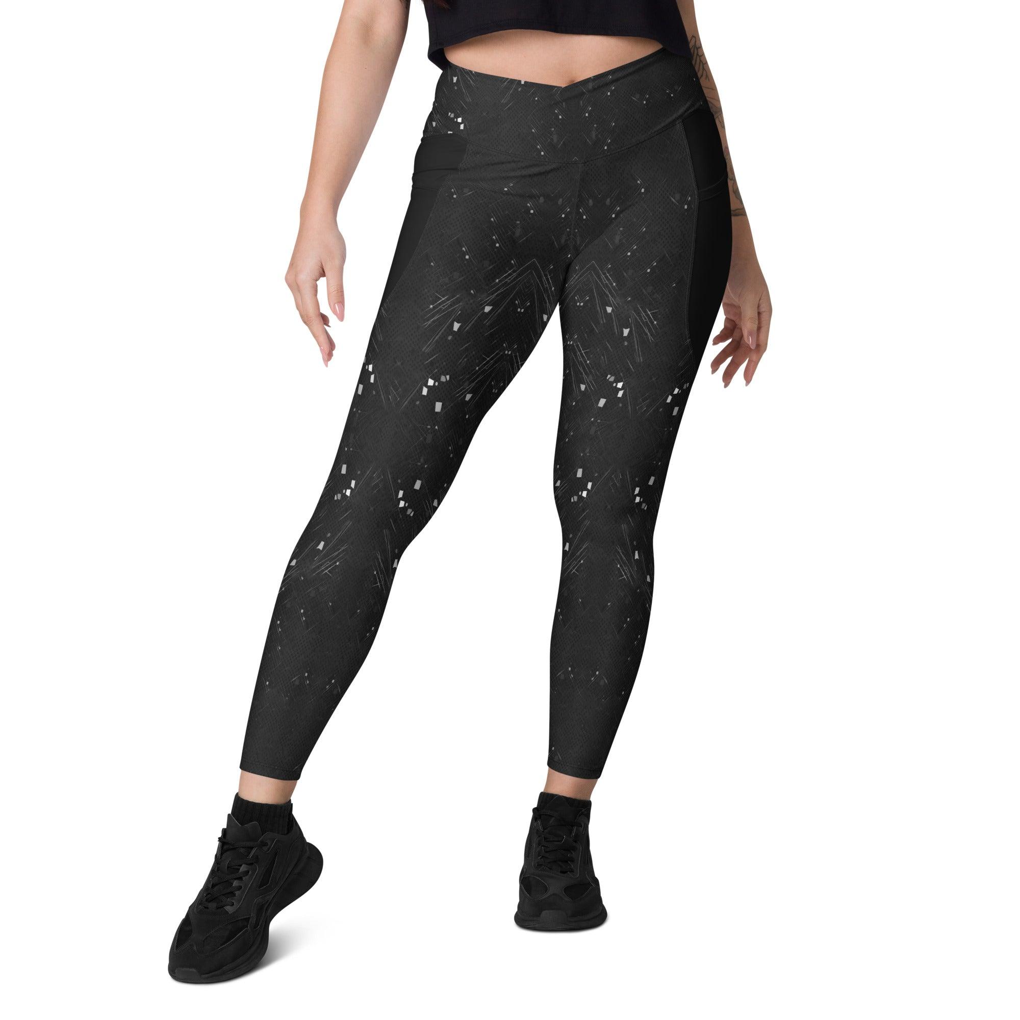 Black snake pattern crossover leggings with side pockets.