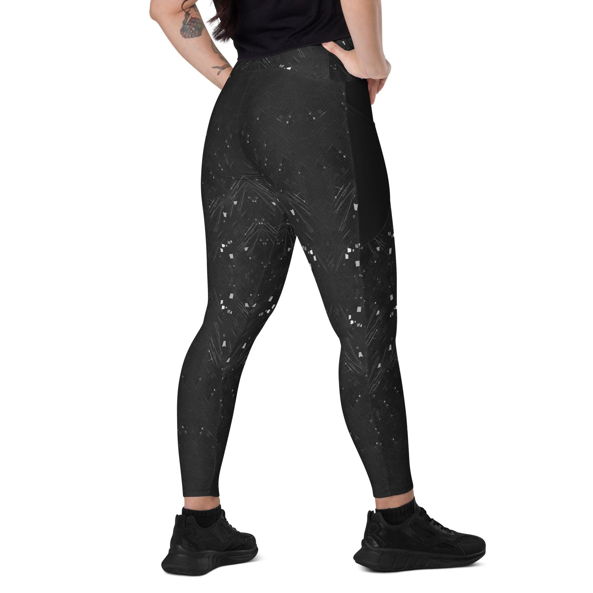 Close-up of snake print on black crossover leggings.