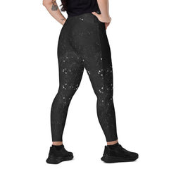 Close-up of snake print on black crossover leggings.