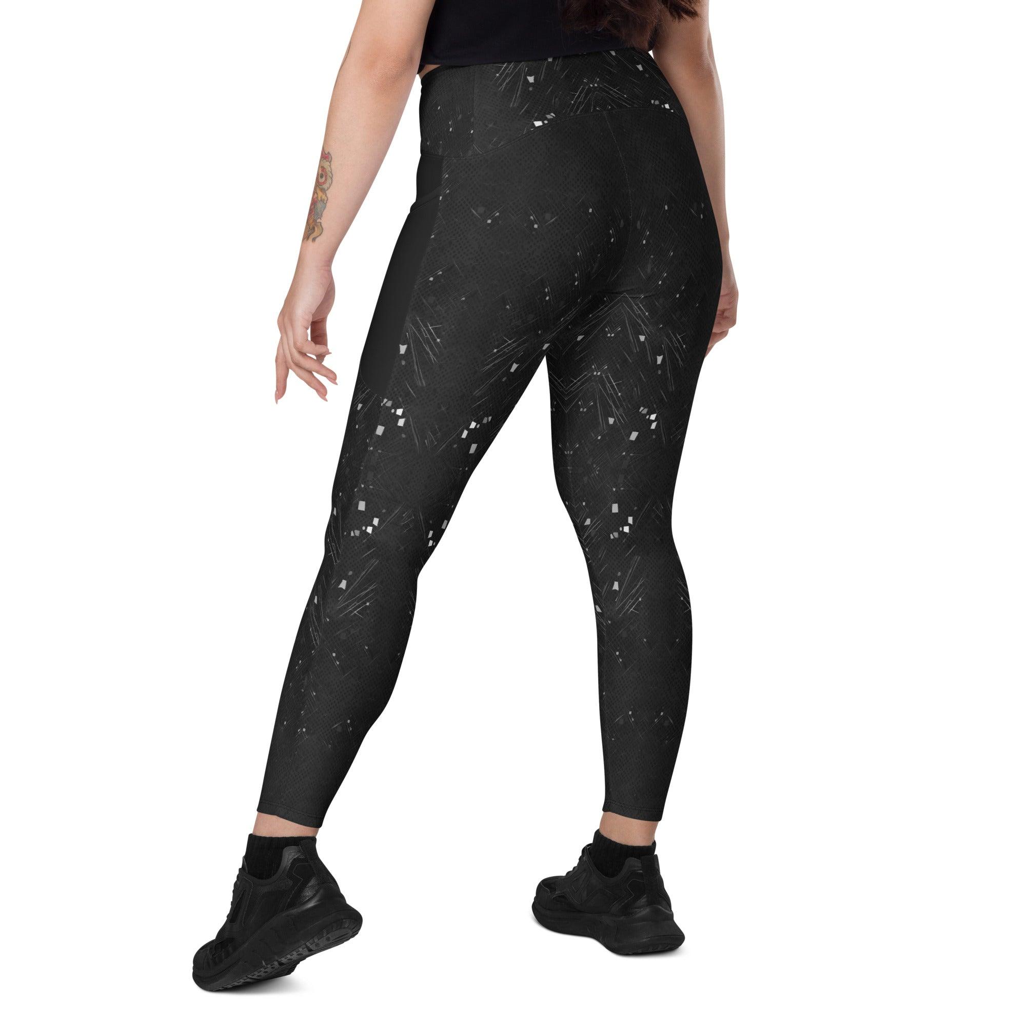 Black snake crossover leggings with pockets for sports and casual wear.