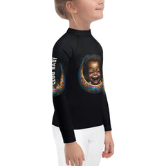 Back view of child in CB3-32 rash guard showing UV protection feature