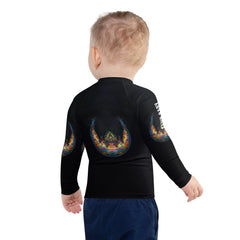 Action shot of child swimming in pool wearing CB3-32 rash guard