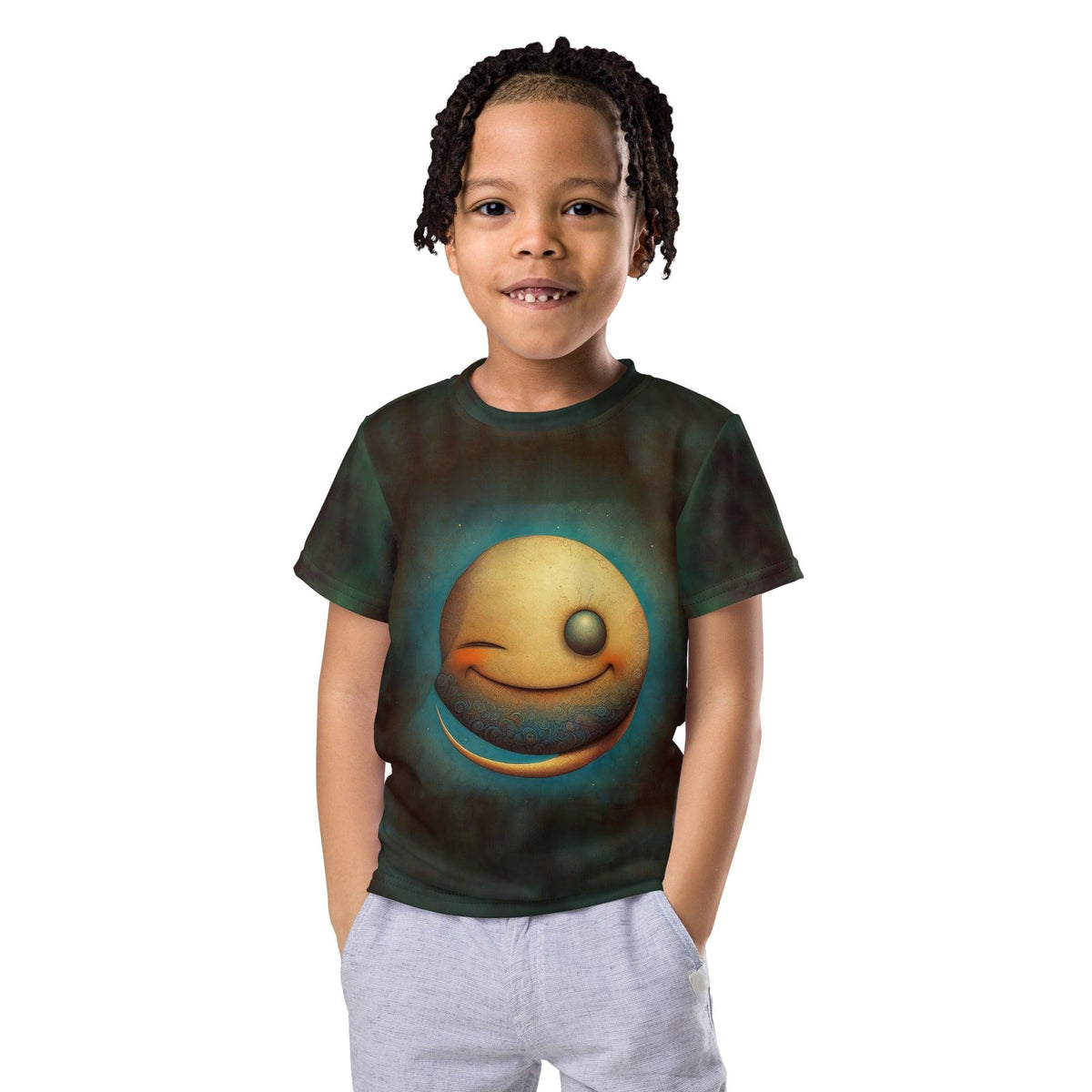 Child smiling in CB3-54 kids crew neck t-shirt, vibrant colors.