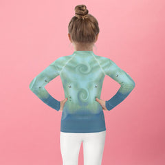 Rear view of kid wearing CB3-64 Rash Guard showcasing the design and fit