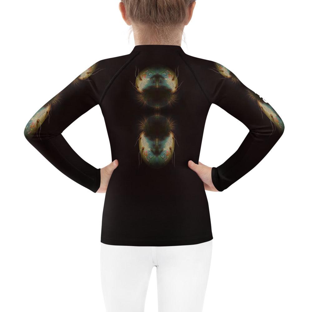 Back view of child wearing CB3-67 sun protection rash guard