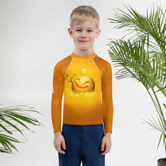 Kids Rash Guard with celestial design for pool and beach.