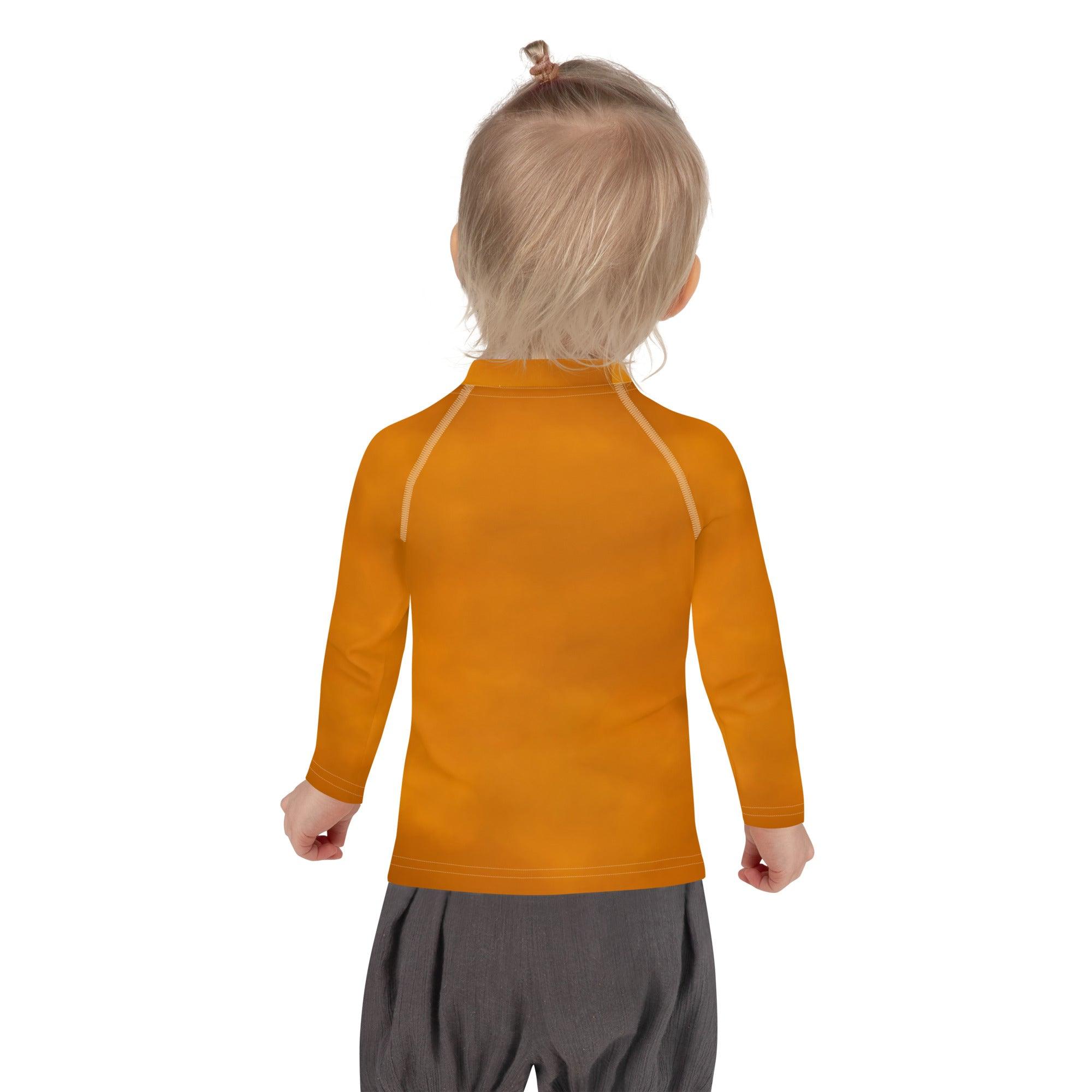 UV protective kids rash guard with moon and stars design.