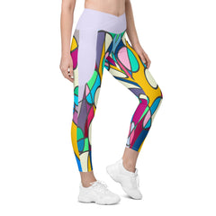Stylish woman wearing Colorful Passion II crossover leggings outdoors.