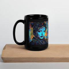 Hand holding Creative Canvas black glossy coffee mug.