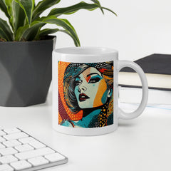 White Glossy Mug with unique drawing design on kitchen counter.