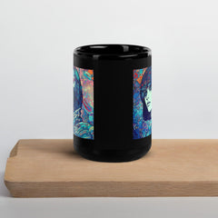 Elegant black glossy mug with Drawing Dynamics III design, side view.