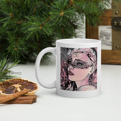 Elegant white glossy coffee mug with intricate line art.