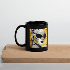 Close-up of black glossy mug with abstract design.