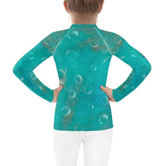 Dreamlands Kids Rash Guard in action - water-resistant.