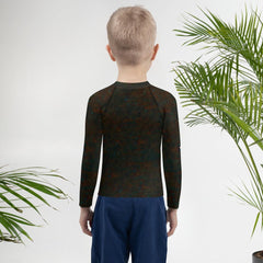 Close-up of Dreamscape Innocence Rash Guard fabric pattern.