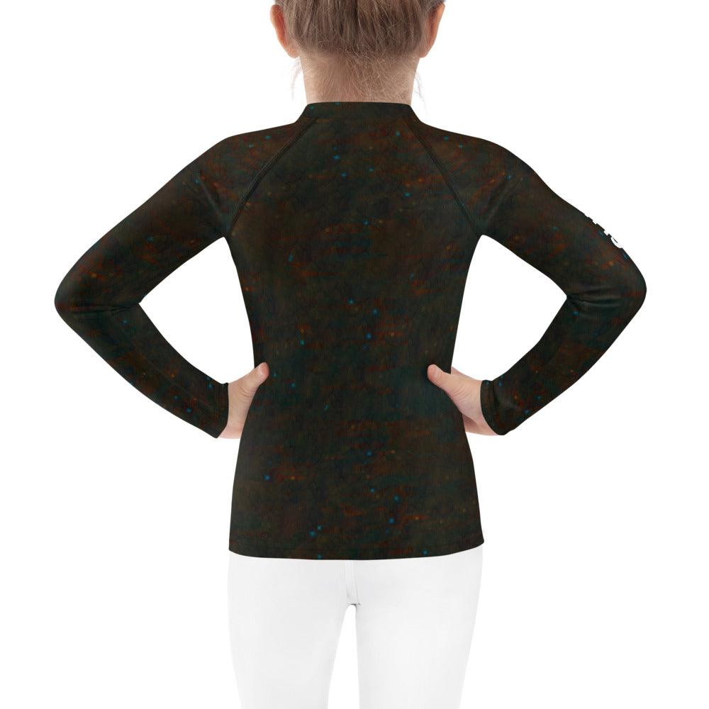 Back view of child in Dreamscape Innocence Kids Rash Guard.