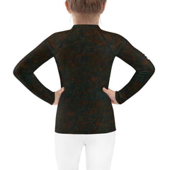 Back view of child in Dreamscape Innocence Kids Rash Guard.