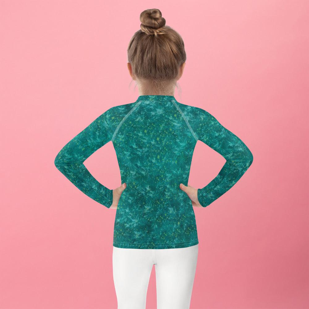 Detail of the Dreamy Eyes pattern on protective Kids Rash Guard.