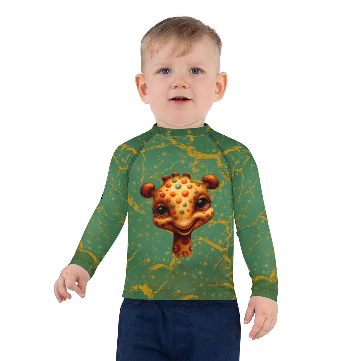 Child wearing Dreamy Giraffe Vision Rash Guard standing on the beach.