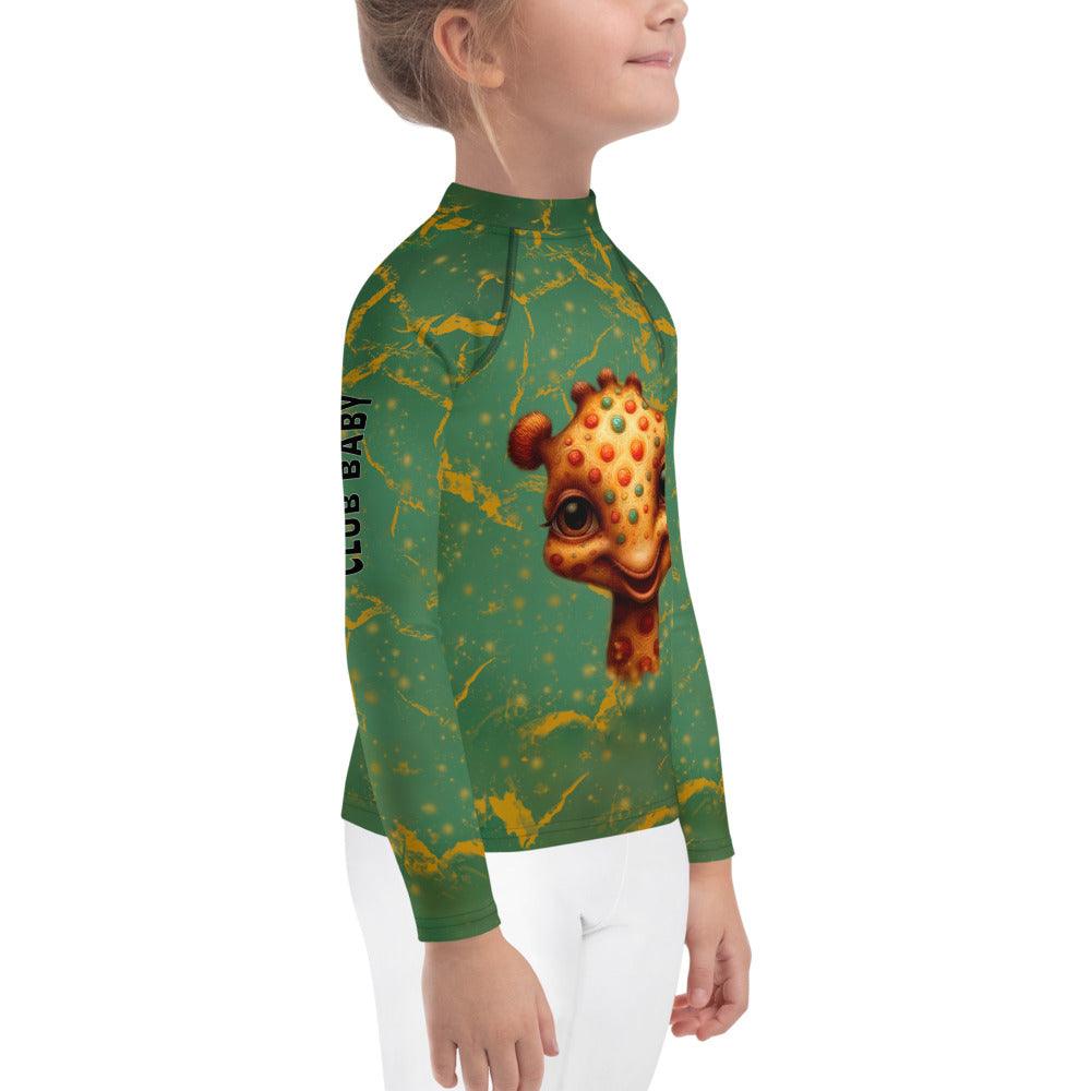 Dreamy Giraffe Vision Rash Guard for kids laid out on sand.