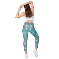 Woman wearing Enchanted Crossover Leggings in a park.