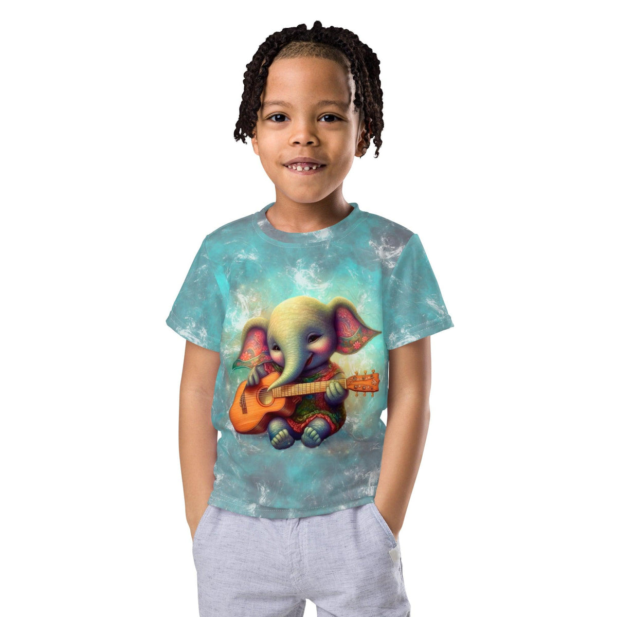 Child wearing Enchanted Elephant Parade crew neck T-shirt smiling.