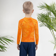 Close-up of Enchanted Iris Wonder Rash Guard fabric and quality.