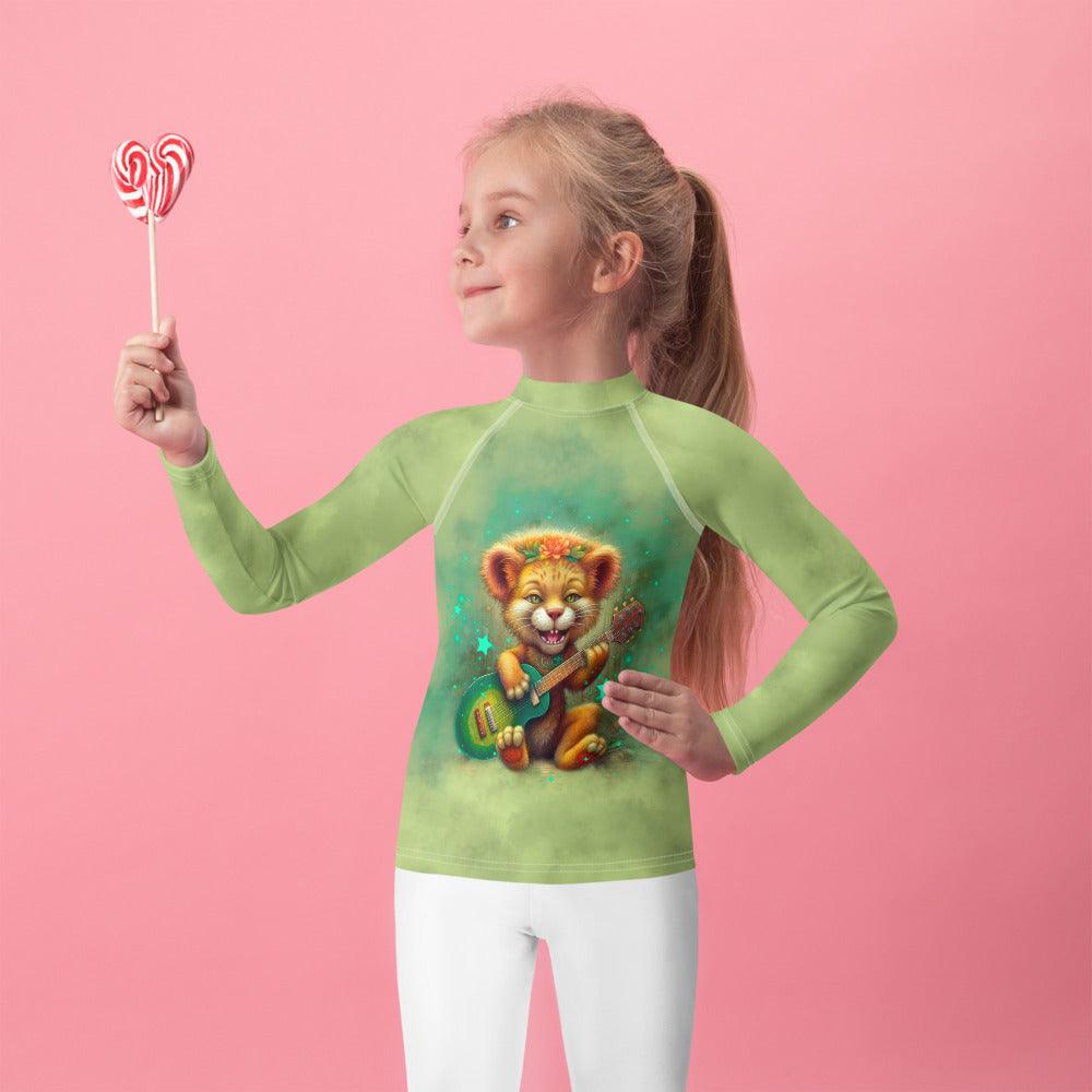 Child wearing Enchanted Lion Eyes Rash Guard at the beach.