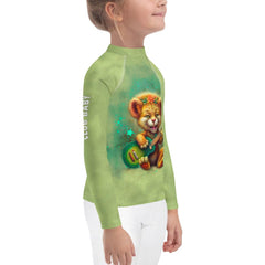 Young athlete in Lion Eyes Rash Guard practicing water sports.