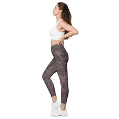 Elegant Enchanted Pupil printed leggings with functional pockets.