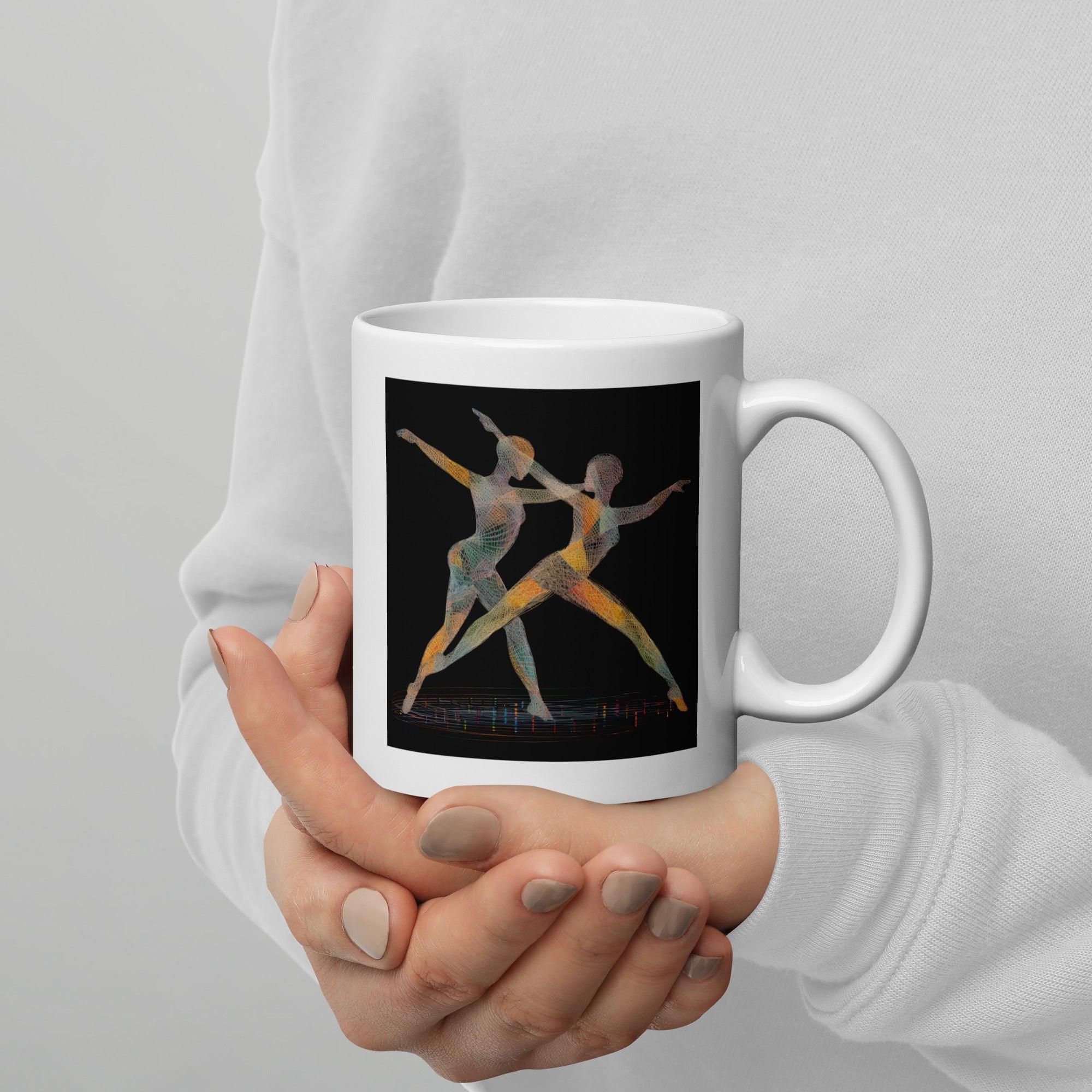 White glossy mug with artistic design of dancing women.