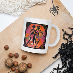 Elegant white glossy mug with balletic style design on a serene backdrop.