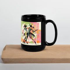 Elegant black mug featuring women’s dance artwork.
