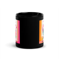 Elegant black glossy mug with balletic fashion design, isolated view.
