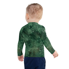 Child playing in water with Feline Beauties Rash Guard.