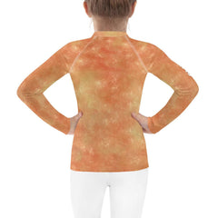 Close-up of Ethereal Youthful Gazes Rash Guard fabric detail.