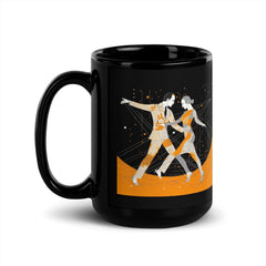 Side view of the glossy black mug with expressive art design.