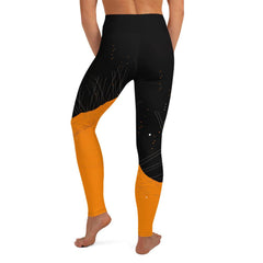 Elegant yoga leggings with expressive feminine patterns for active wear.