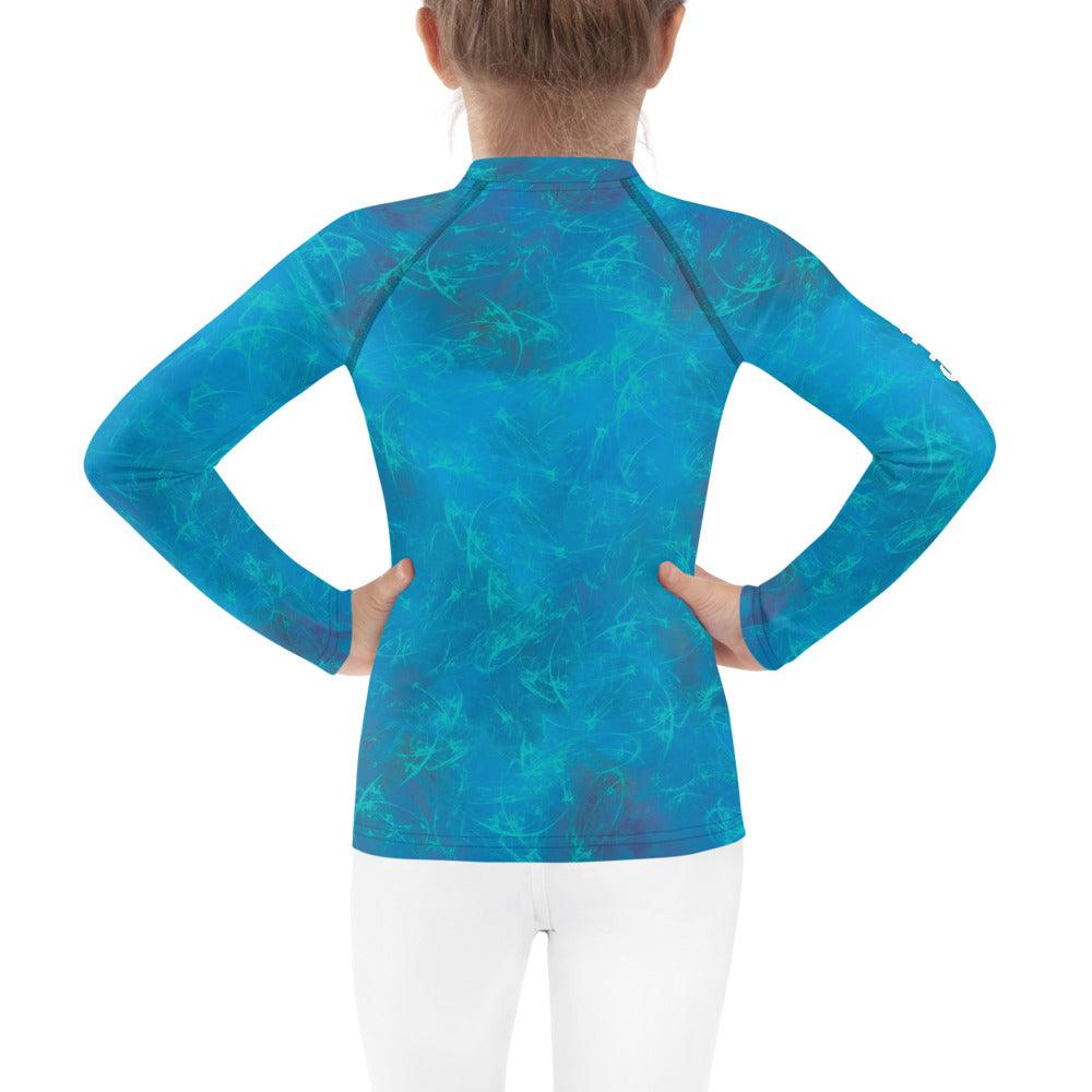 Side view of kid modeling Fairyland's Stars Rash Guard.